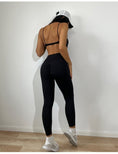 Load image into Gallery viewer, Yoga Clothes Women Fashionable Sexy Twisted Bra Irregular Asymmetric Hip Lifting Pleated Trousers Yoga Suit
